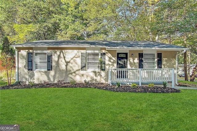 ranch-style home with a porch and a front lawn