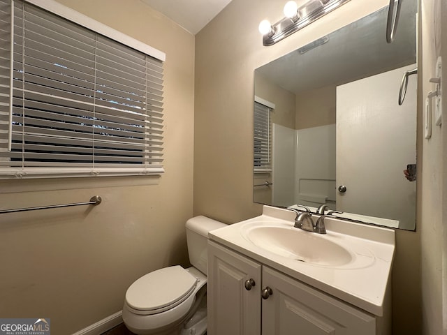 bathroom with vanity and toilet