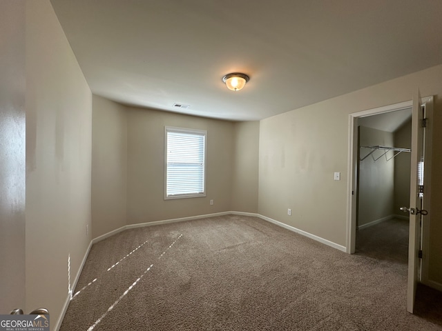 view of carpeted spare room