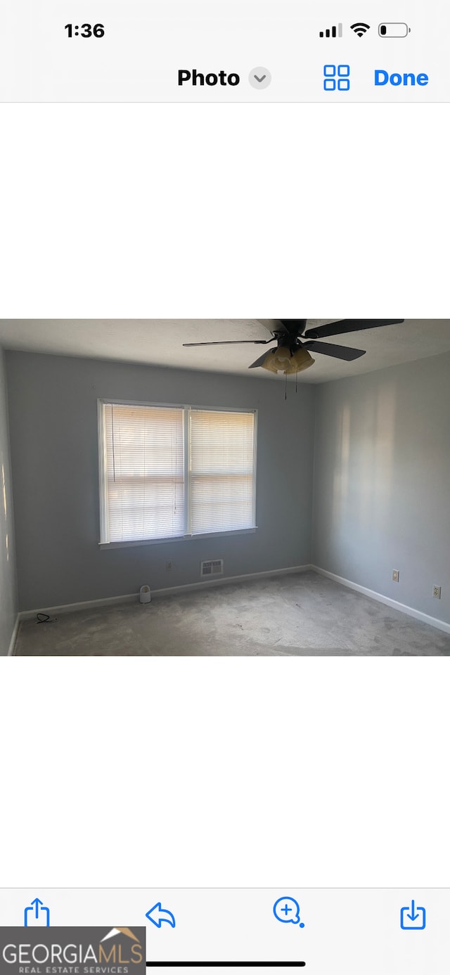 empty room with ceiling fan