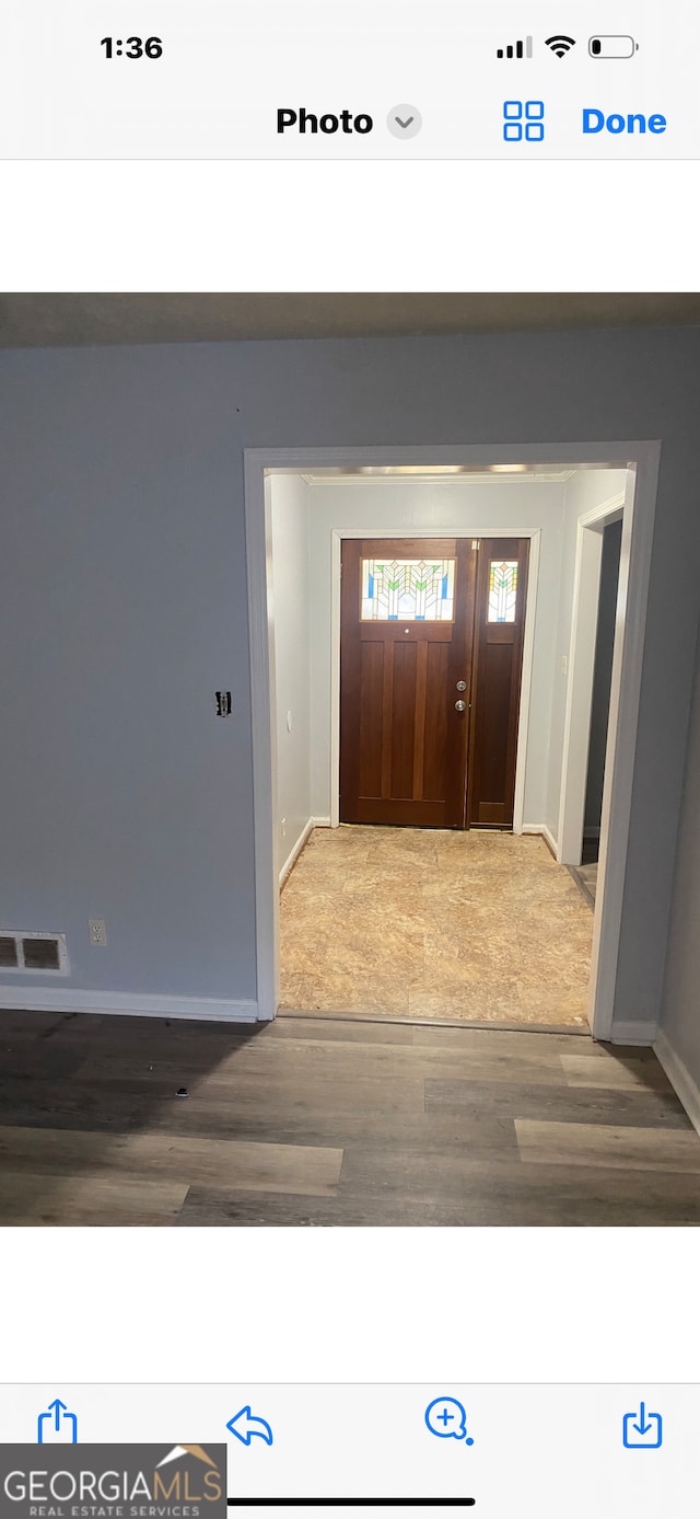 foyer featuring carpet