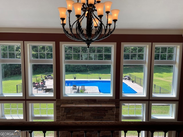 interior details featuring a notable chandelier