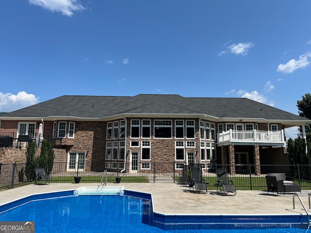 view of pool featuring a patio area