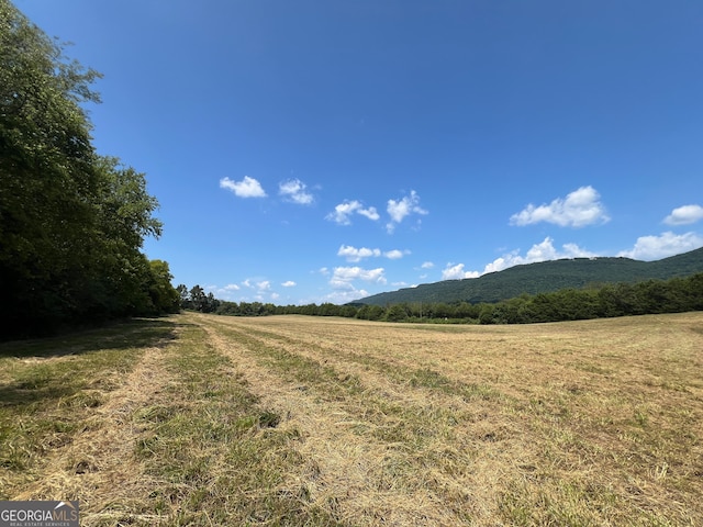 property view of mountains with a rural view