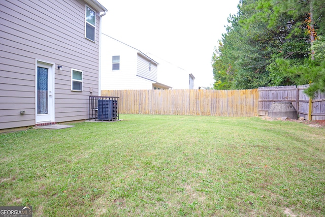 view of yard featuring central AC