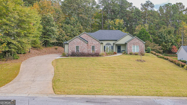 ranch-style home with a front yard