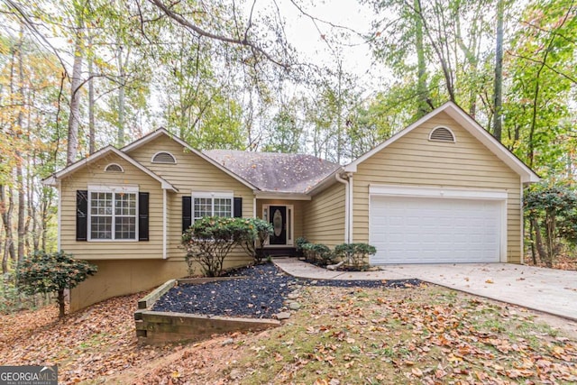 single story home featuring a garage