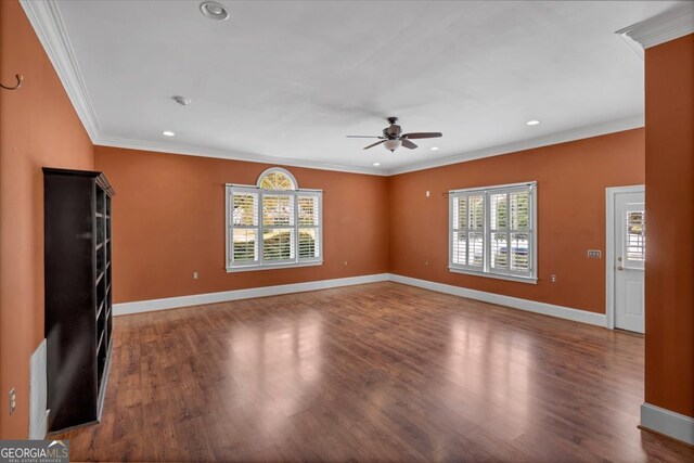 unfurnished living room with ornamental molding, hardwood / wood-style floors, and ceiling fan