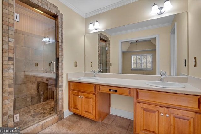 bathroom with vanity, a shower with shower door, ornamental molding, and tile patterned floors