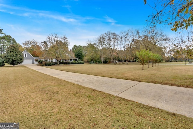 view of yard featuring a garage