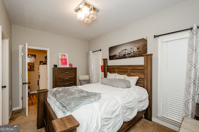 bedroom with light carpet