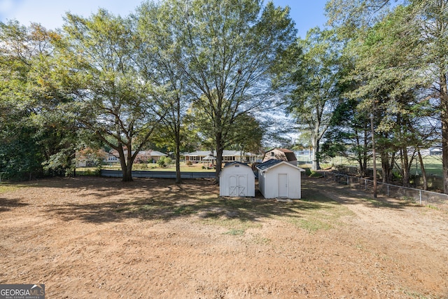 view of yard with a storage shed