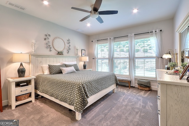 carpeted bedroom with ceiling fan