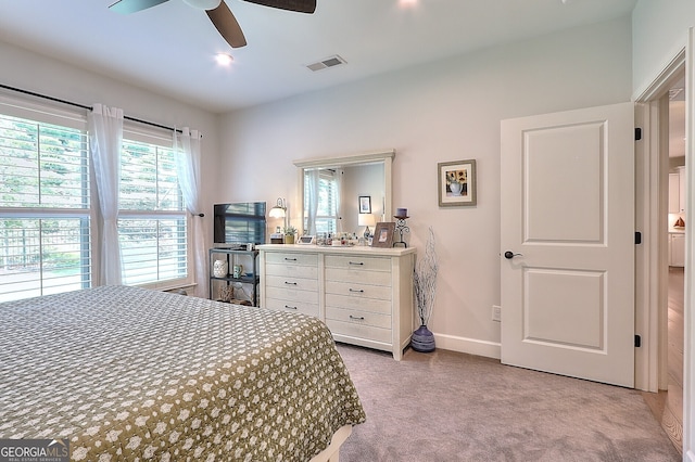 carpeted bedroom featuring ceiling fan