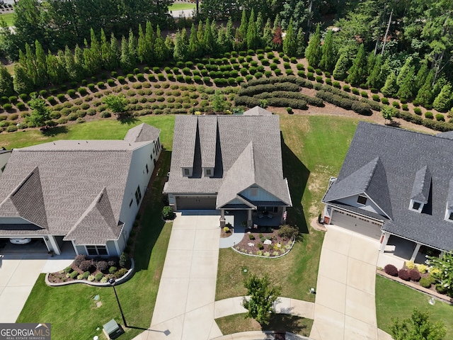 birds eye view of property featuring a rural view