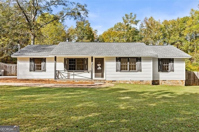 ranch-style home featuring a front lawn