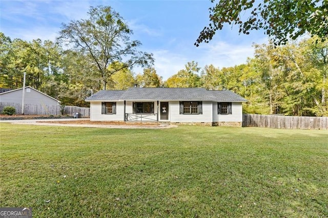 ranch-style house featuring a front lawn