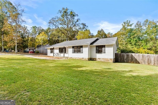 view of front of home with a front yard