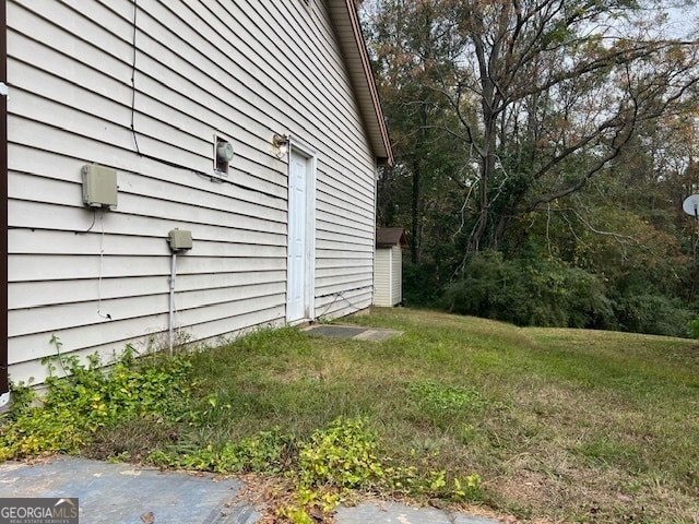 view of home's exterior featuring a lawn