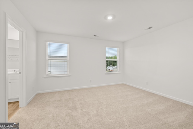 view of carpeted spare room