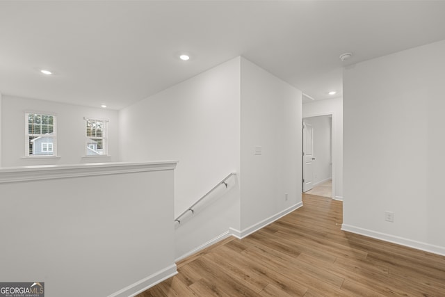 hallway with light wood-type flooring