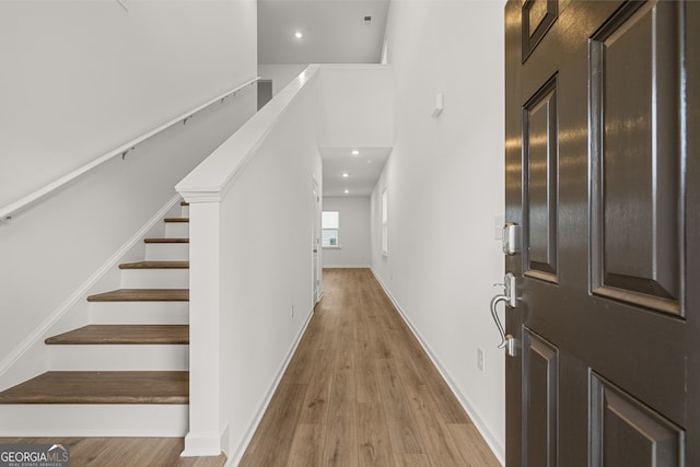 foyer with light wood-type flooring