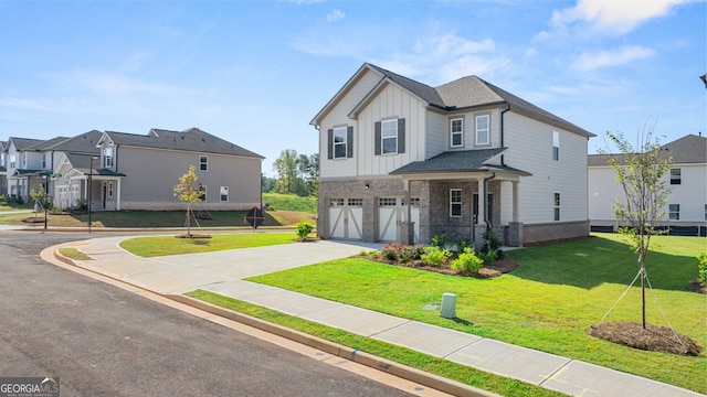 view of front of house featuring a front yard and a garage