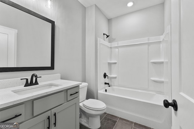 full bathroom featuring tile patterned flooring, shower / tub combination, vanity, and toilet