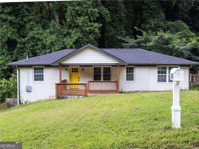 ranch-style home with a front yard