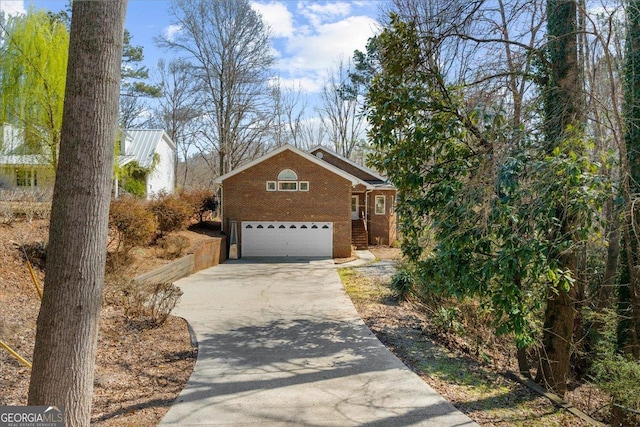 view of front facade with an attached garage and concrete driveway