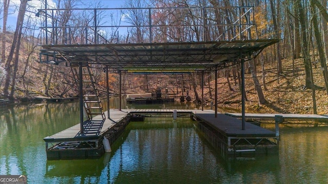 view of dock with a water view