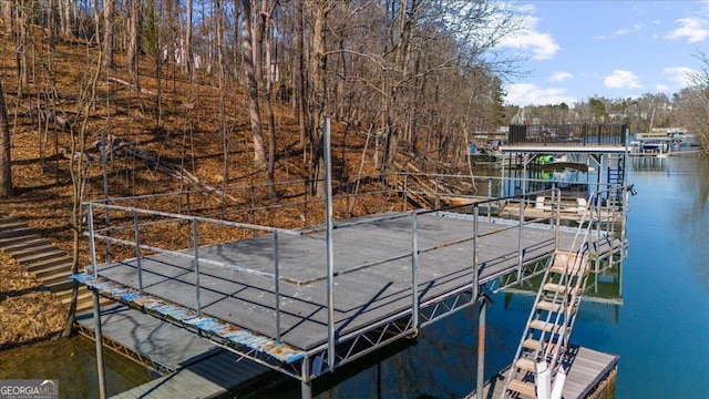 view of dock with a water view