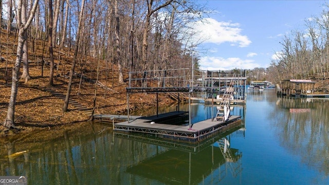 dock area featuring a water view