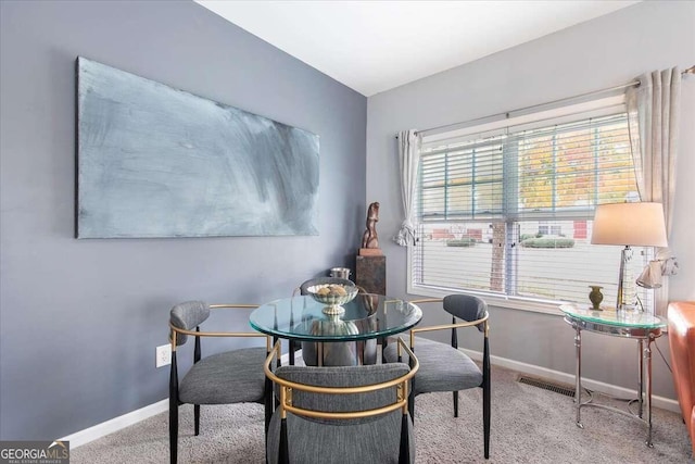 dining room featuring carpet floors