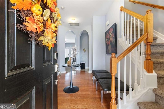 entrance foyer featuring hardwood / wood-style flooring