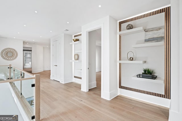 hallway featuring light hardwood / wood-style floors