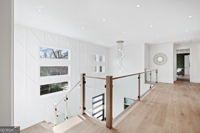 corridor featuring light hardwood / wood-style flooring