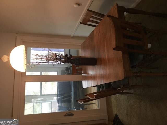 interior space featuring wood walls