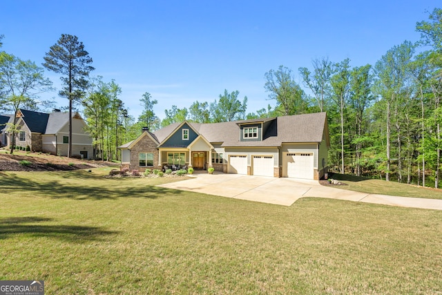 view of front facade with a front yard and a garage