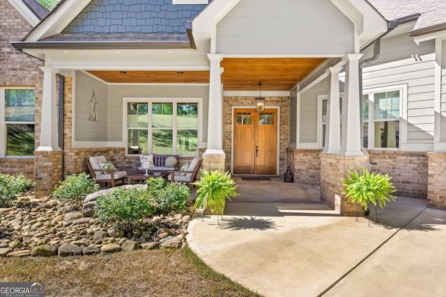 property entrance featuring a porch