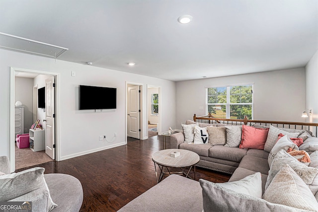 living room featuring dark hardwood / wood-style flooring