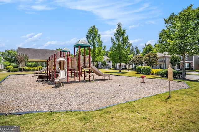 view of playground featuring a lawn