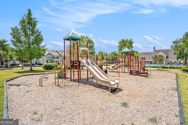 view of playground with a pool