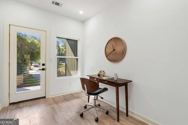 office space featuring light hardwood / wood-style floors