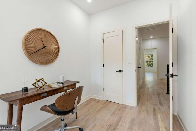 office space featuring light wood-type flooring