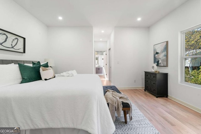 bedroom featuring light wood-type flooring