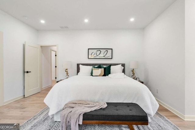 bedroom featuring light hardwood / wood-style flooring