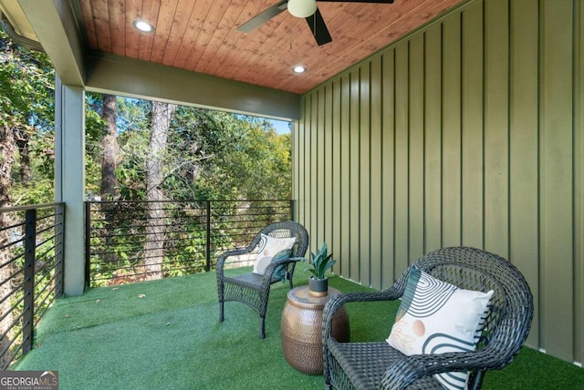 view of patio featuring a balcony and ceiling fan