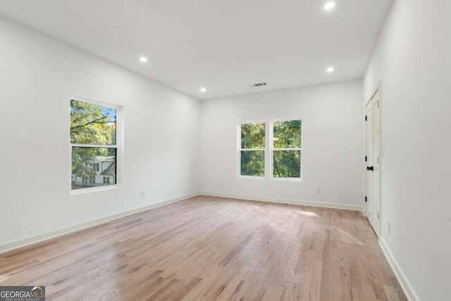 empty room with light wood-type flooring