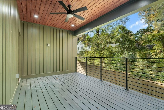 wooden terrace featuring ceiling fan